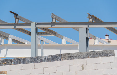 Steel Frames of A Building Under Construction on white background