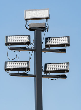 The Stadium Spot-light tower on background sky