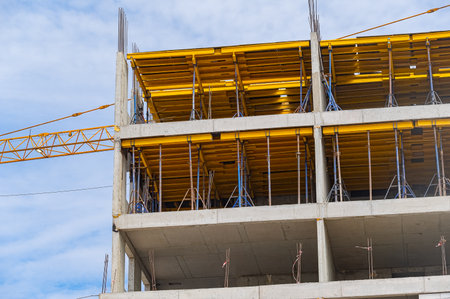 Construction of buildings using monolithic technology. Reinforced concrete frame of the building,...