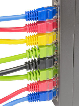 Closeup of network cables connected to router on whiteの写真素材