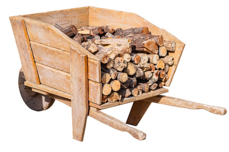 an old wooden wheelbarrow with firewood on a white background