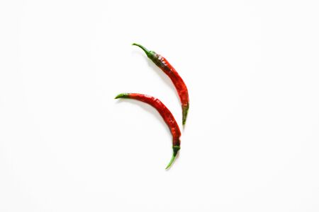 Red chili pepper isolated on a white background.の写真素材