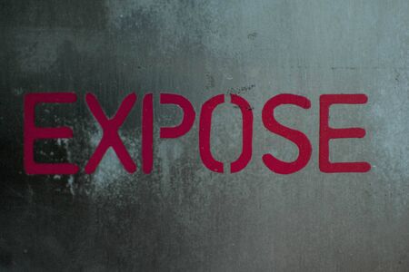 The word Expose on the steel wall.の写真素材