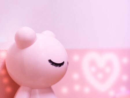 The doll bear on pink background.valentine's day concept.love concept.の写真素材