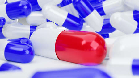 Selective focus of a pills red capsules on the blue capsules background, 3D rendering.の写真素材