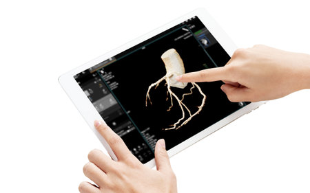 The tablet screen highlights a realistic image, with a hand pointing for analysis, isolation on white background, clipping path.の写真素材
