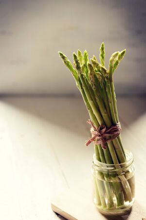fresh asparagus on wooden table food organicの写真素材