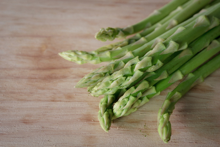 fresh asparagus on wooden table food organicの写真素材