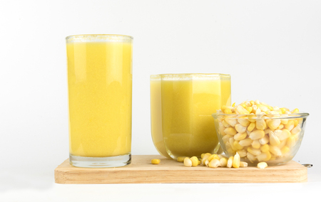 Closeup, fresh sweet corn juice (corn milk) isolated on white background.の写真素材
