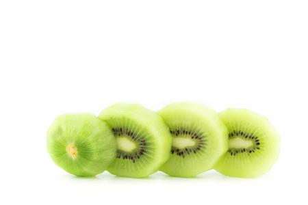 sliced Kiwi fruit isolated on white background cutout juiceの写真素材