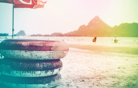 Rubber ring on the beach in thailandの写真素材