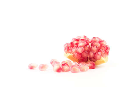 Ripe pomegranates with leaves isolated on a white background.の写真素材