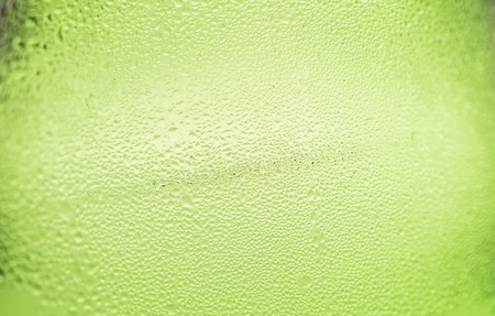 Green Abstract Water Drops Background,Natural water drops on glass,water drop textureの写真素材