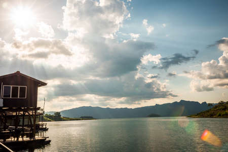 landscape mountains and water view in sunset  sky, in kanchanaburi,thailand.の写真素材