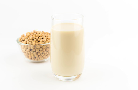 milk with soy beans on white backgroundの写真素材