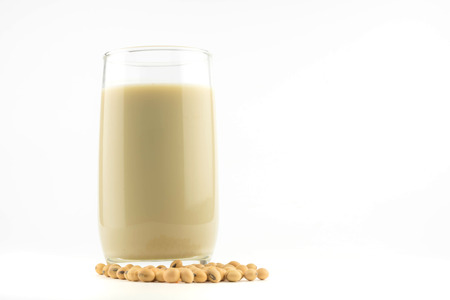 milk with soy beans on white backgroundの写真素材