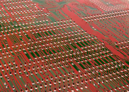 Computer circuit background in a red color and in a perspective viewの写真素材