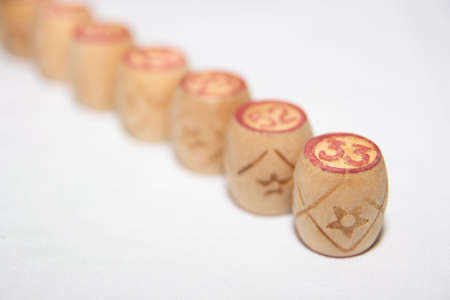 Row of bingo barrels blurred in a depth of field view