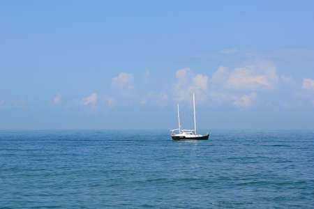 Small yacht in the quiet seaの写真素材