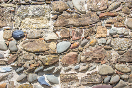 background of old stone wall texture photo.の写真素材