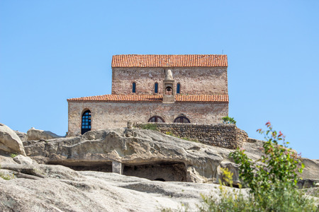 Ancient Orthodox Church in antique cave city Uplistsikhe, Georgia.の写真素材