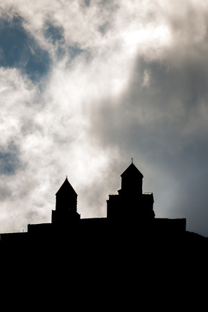 Gergeti Trinity Church in the mountains of the Caucasus.の写真素材