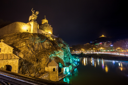 Night Evening Illuminated View Of The Metekhi Church And The Equestrian Statue Of King Vakhtang Gorgasali On The Metekhi Cliff In Old Historic District Of Tbilisi Georgia.のeditorial素材