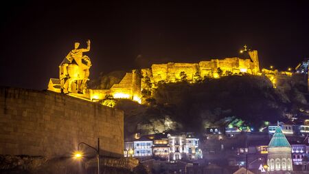Aerial night view of Old Tbilisi, Georgia with Illuminated churches and Medieval fortress of  narikala, 25.11.2016.の写真素材