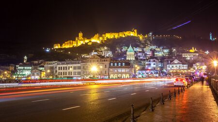 Aerial night view of Old Tbilisi, Georgia with Illuminated churches and Medieval fortress of  narikala, 25.11.2016.のeditorial素材
