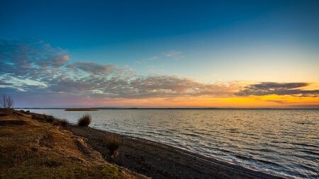 Colorful sky and water in lake Paliastomi in morning , Poti, Georgia.の写真素材