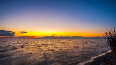 Colorful sky and water in lake Paliastomi in morning , Poti, Georgia.の写真素材