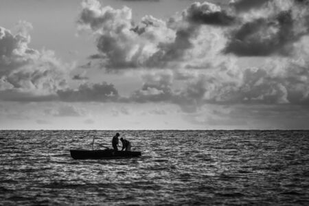 Boat on a Black Sea, beautiful sunset, Poti, Georgia.の写真素材