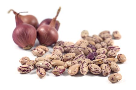 colorful beans and onion isolated on white background.の写真素材