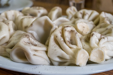Khinkali - Georgian traditional food. Handmade rustic worldwide recipe book.の写真素材