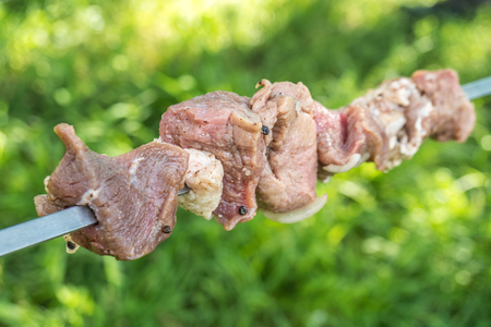 Beef and pork steak on the grill raw meat.の写真素材