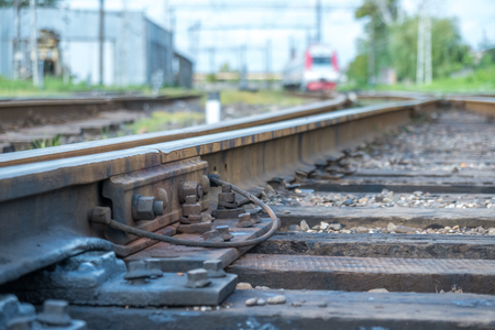 The passenger train enters the railway station.の写真素材