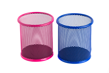 Red and blue basket for pens and pencils on the white background.の写真素材