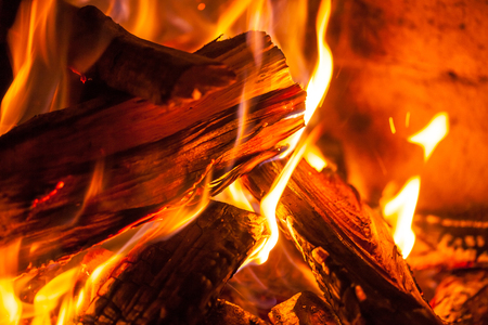A fire burns in a fireplace, Fire to keep warm.の写真素材