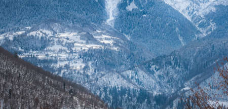 Mountain village in the Caucasus Mountains in winter, Svaneti, Georgia.の写真素材