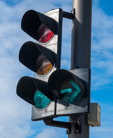 traffic light with a beautiful blue sky in background.の写真素材