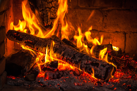 A fire burns in a fireplace, Fire to keep warm.の写真素材