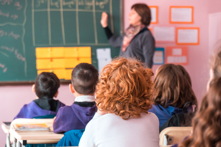 school children are participating actively in class. Educationの写真素材