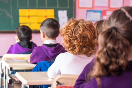 school children are participating actively in class. Educationの写真素材