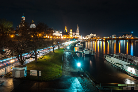 Beautiful night view of the city and reflections in the Elbe river in Dresden, Germany.の写真素材