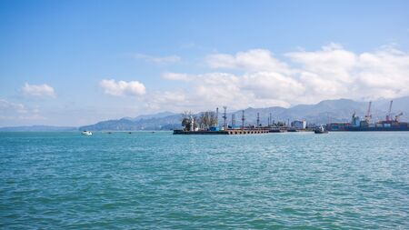 Sunny Sky Over Calm Water Of Sea. Natural Landscape Background With Coast Of Batumi, Adjara, Georgia.の写真素材