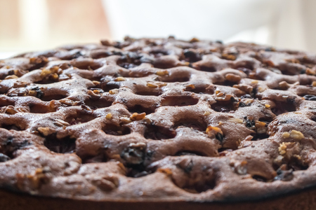 home made cake with raisins and nuts.の写真素材