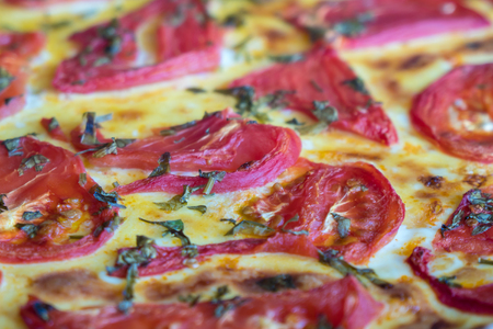 Italian Pizza Margherita (Margarita) with tomato and Mozzarella cheese - background.の写真素材