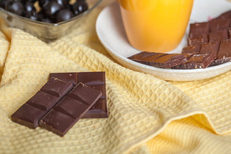 breakfast with bread and butter, with olives and chocolate.の写真素材