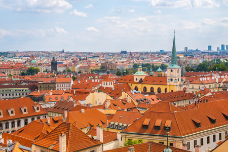 View over historic center of Prague with castle Prague city panorama, red roofs of Prague, Czech Republic.の写真素材