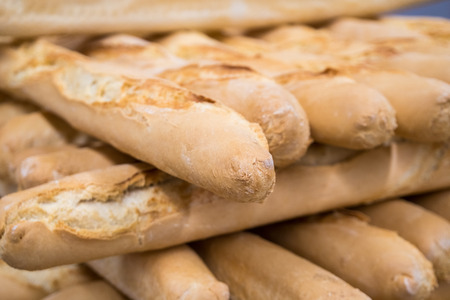 fresh bread on the shelves in bakery, food.の写真素材